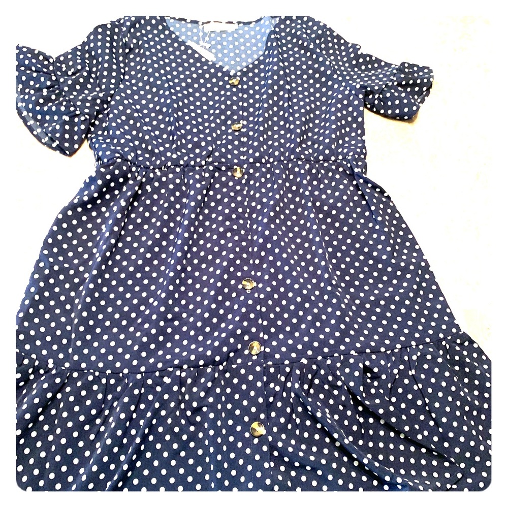 Navy blue and white polka dot dress with a belt